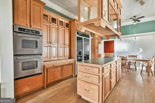 a view of a livingroom with furniture and a fireplace