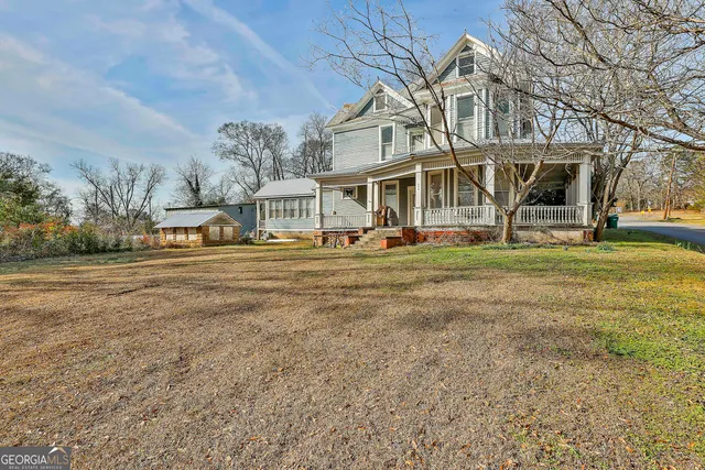 a kitchen with stainless steel appliances granite countertop a stove and a refrigerator