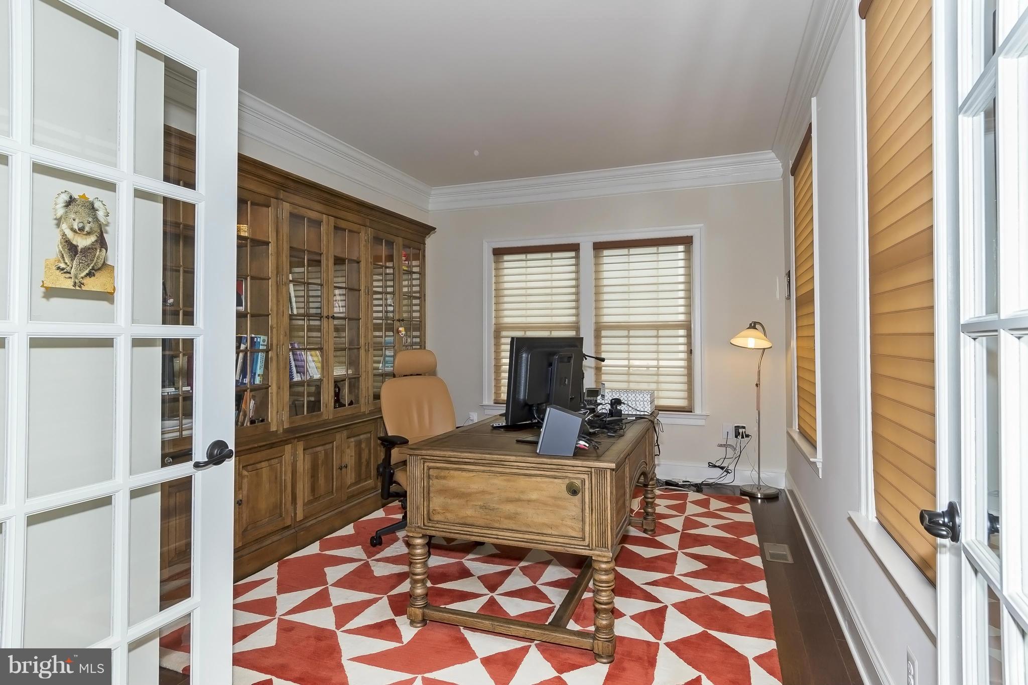 7733 Elmwood Road Fulton, MD 20759 - Photo 2 of 30 a living room with furniture and a floor to ceiling window