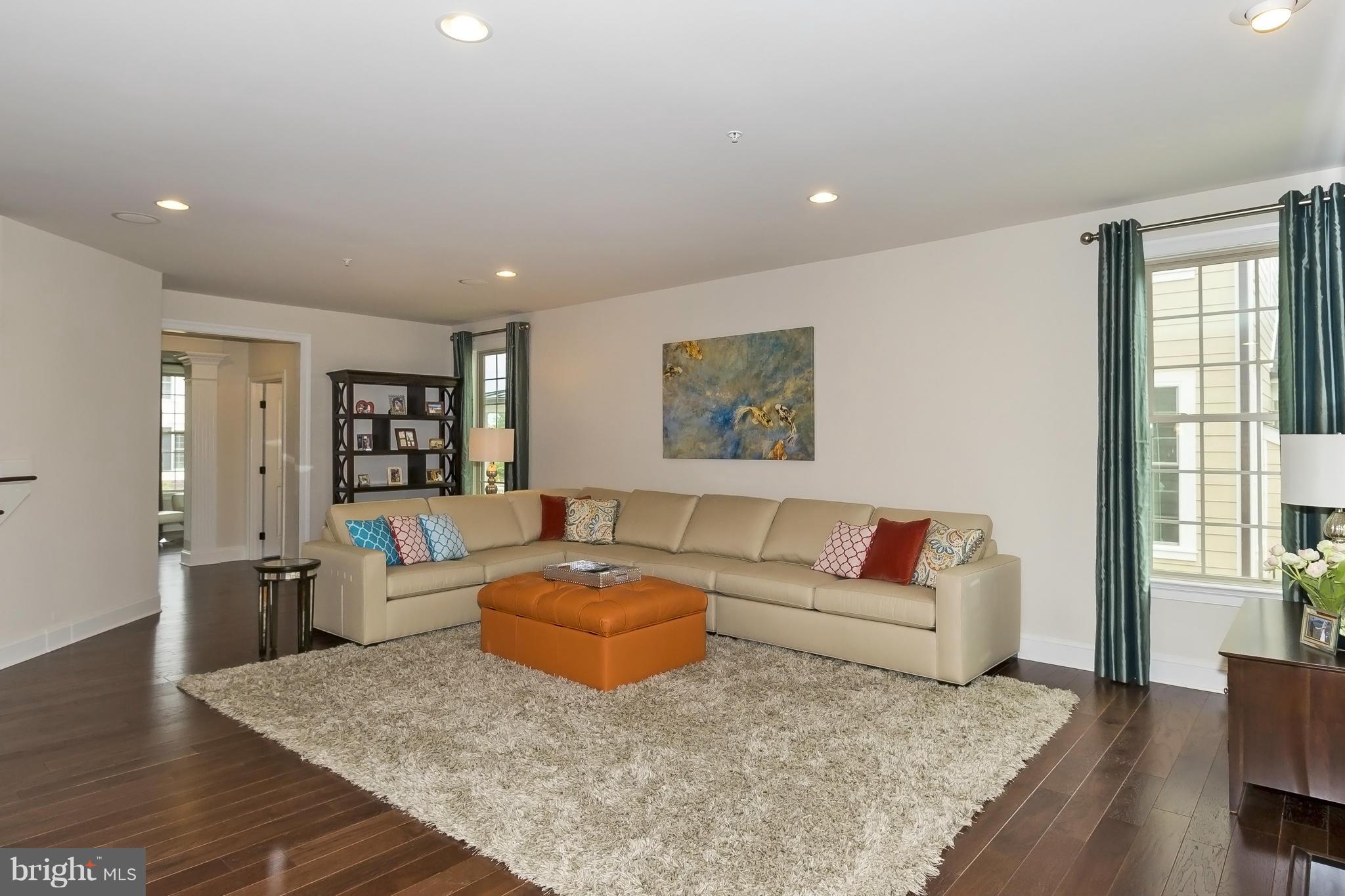 7733 Elmwood Road Fulton, MD 20759 - Photo 12 of 30 a living room with furniture and a couch