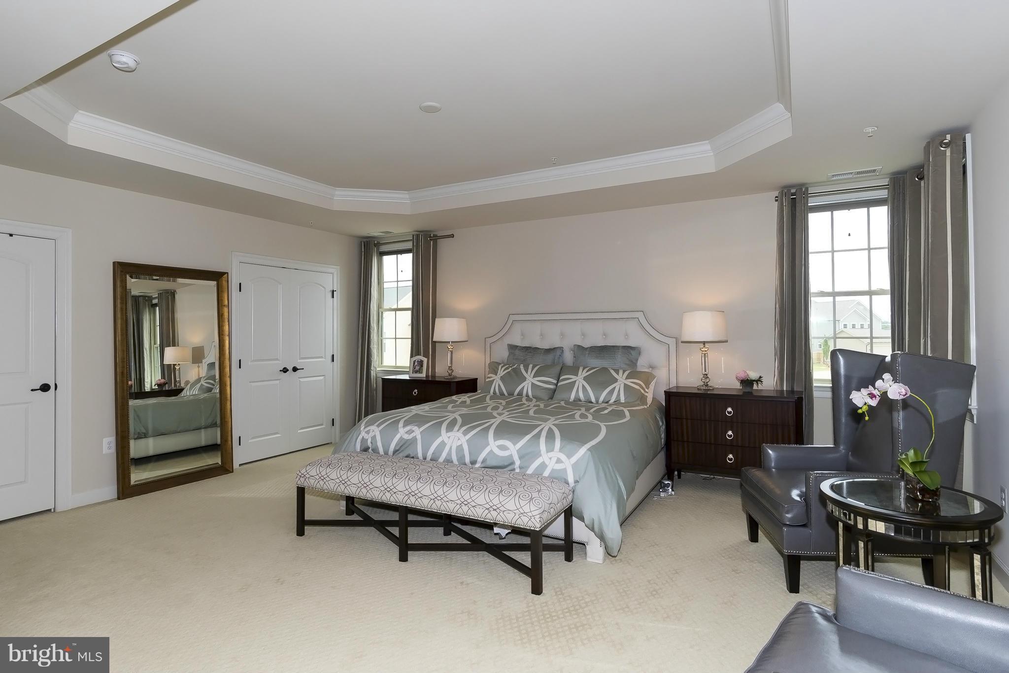7733 Elmwood Road Fulton, MD 20759 - Photo 16 of 30 a bedroom with a bed and a window