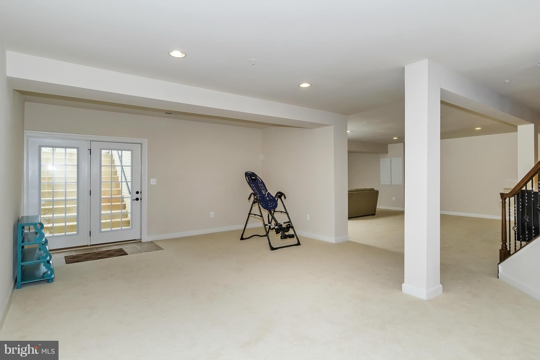7733 Elmwood Road Fulton, MD 20759 - Photo 24 of 30 a view of a room with gym equipment