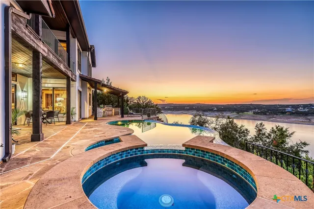a view of a swimming pool with an ocean view