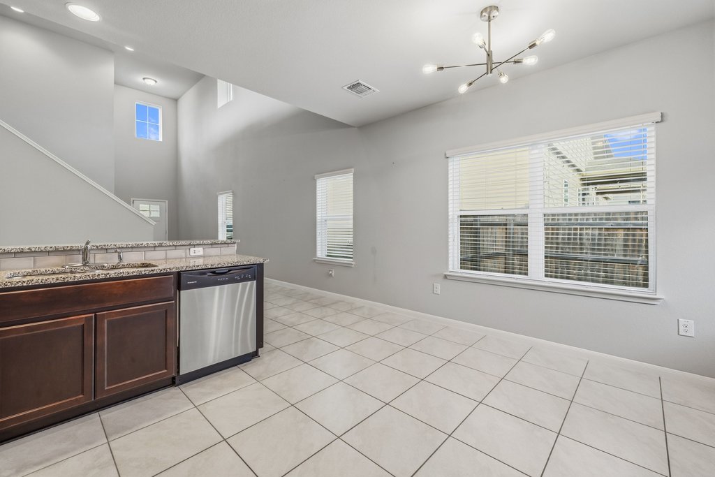 6517 Ranchito Drive Austin, TX 78744 - Photo 15 of 36 Dining space positioned for easy flow between kitchen and living