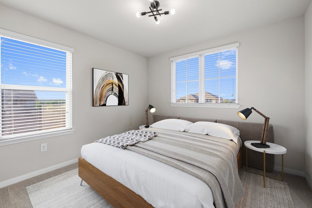 6517 Ranchito Drive Austin, TX 78744 - Photo 22 of 36 Upstairs bedroom with plenty of natural light (image may be virtually staged)