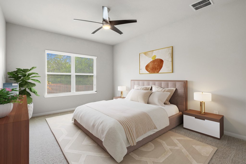 6517 Ranchito Drive Austin, TX 78744 - Photo 3 of 36 Spacious primary suite with natural light and privacy (image may be virtually staged)