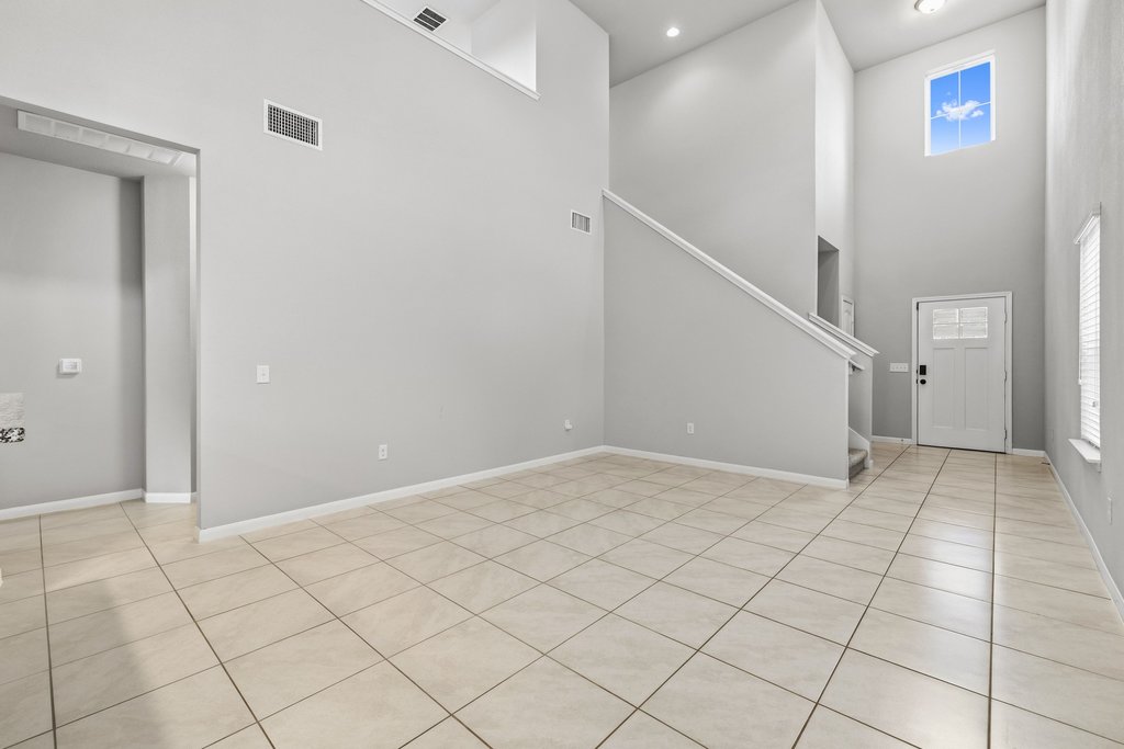 6517 Ranchito Drive Austin, TX 78744 - Photo 8 of 36 Bright entryway with easy access to main living areas