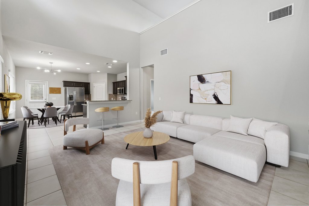 6517 Ranchito Drive Austin, TX 78744 - Photo 9 of 36 Open-concept living space designed for comfort and functionality (image may be virtually staged)