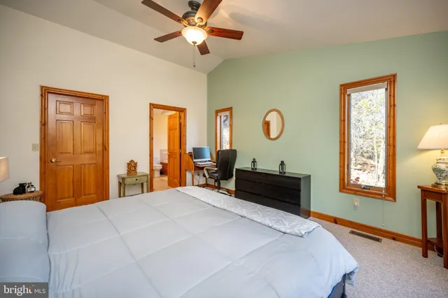 a view of a two chairs in the patio