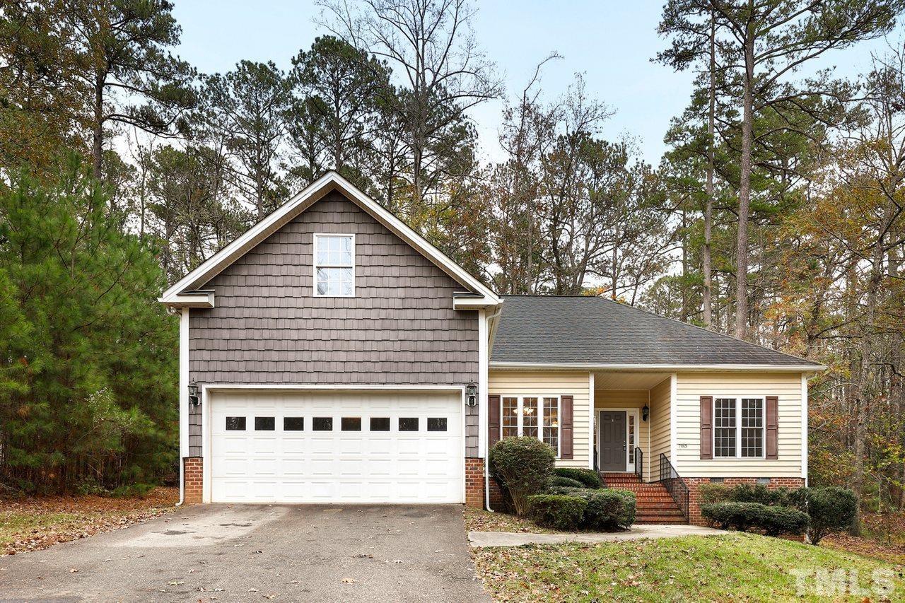 7015 Cedar Road Sanford, NC 27332 - Photo 1 of 30 a view of a house with a yard