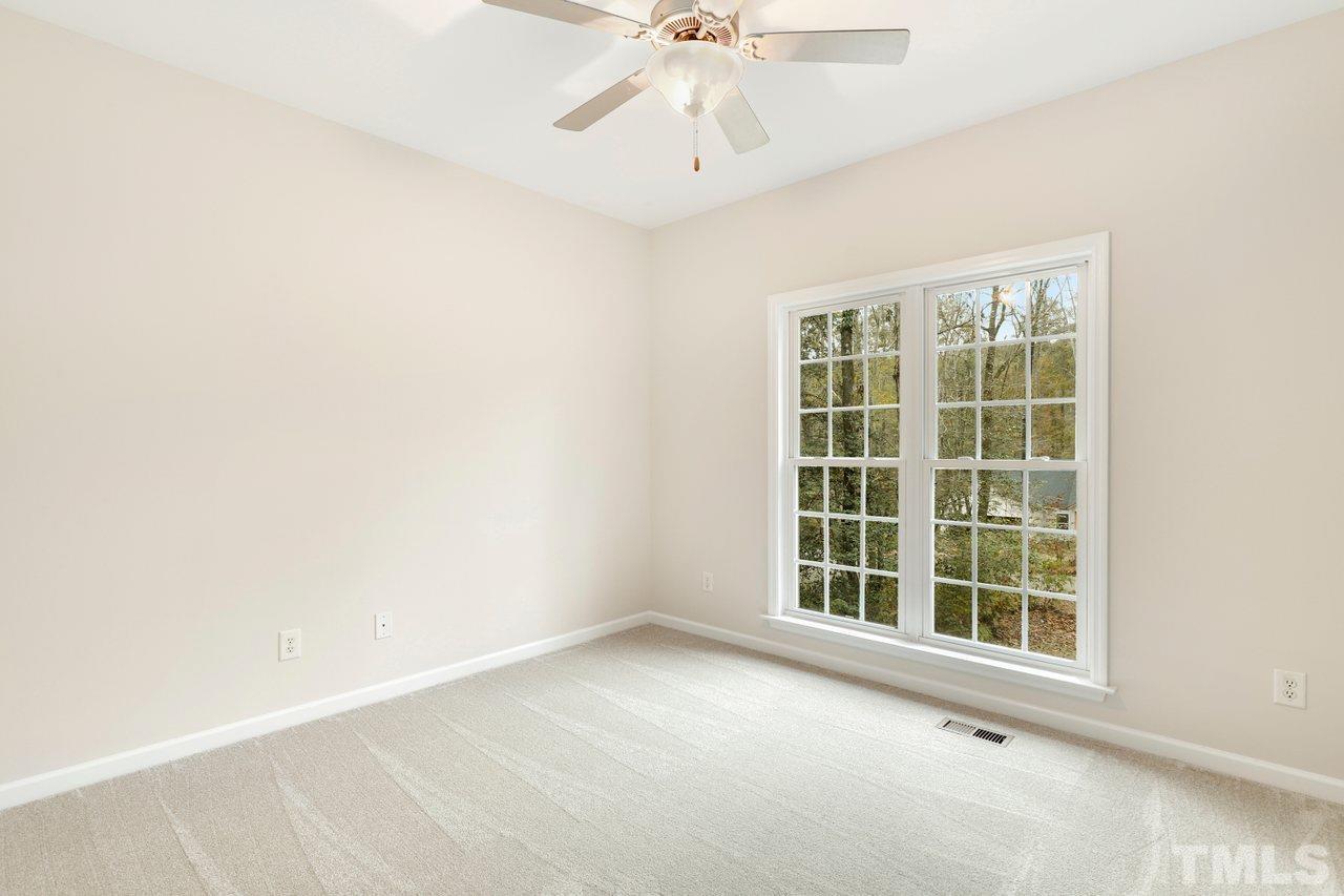 7015 Cedar Road Sanford, NC 27332 - Photo 16 of 30 an empty room with a window