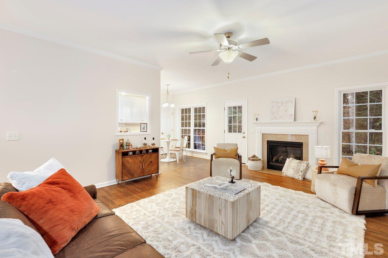 7015 Cedar Road Sanford, NC 27332 - Photo 2 of 30 a living room with furniture and a fireplace