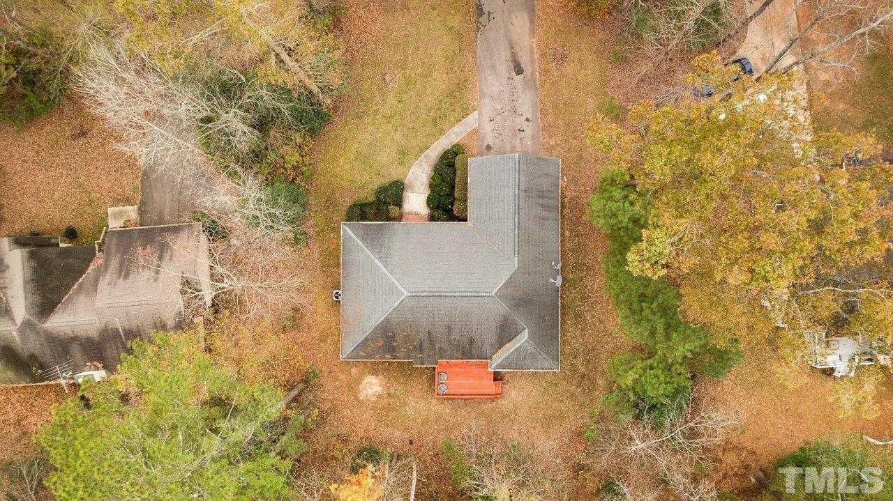 7015 Cedar Road Sanford, NC 27332 - Photo 28 of 30 a bathroom with a sink and mirror