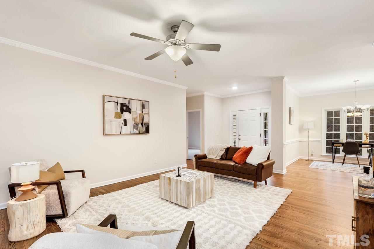 7015 Cedar Road Sanford, NC 27332 - Photo 4 of 30 a living room with furniture and wooden floor