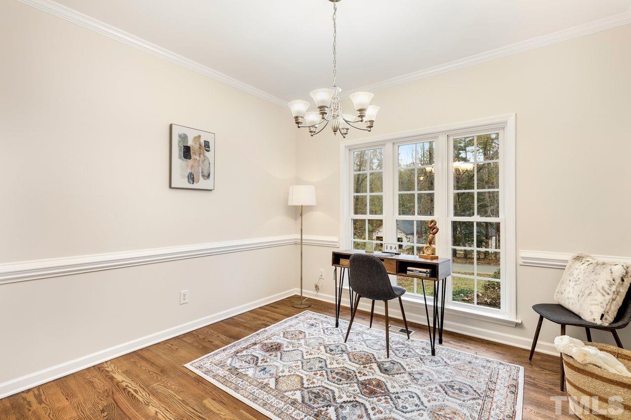 7015 Cedar Road Sanford, NC 27332 - Photo 9 of 30 a view of a workspace with furniture and a window