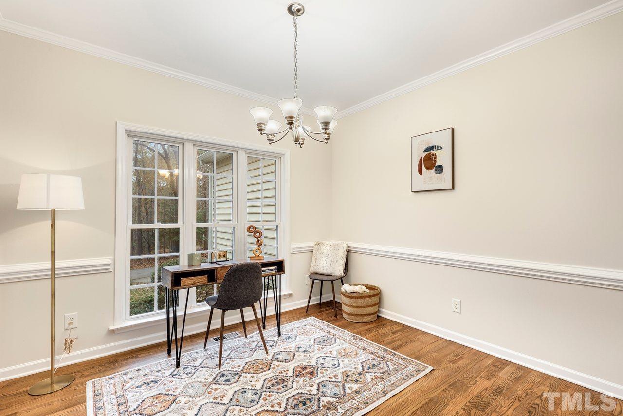 7015 Cedar Road Sanford, NC 27332 - Photo 10 of 30 a view of a dining room with furniture window and wooden floor