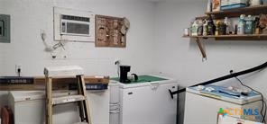 496 Romona Road Seadrift, TX 77983 - Photo 17 of 35 a bathroom with a bathtub