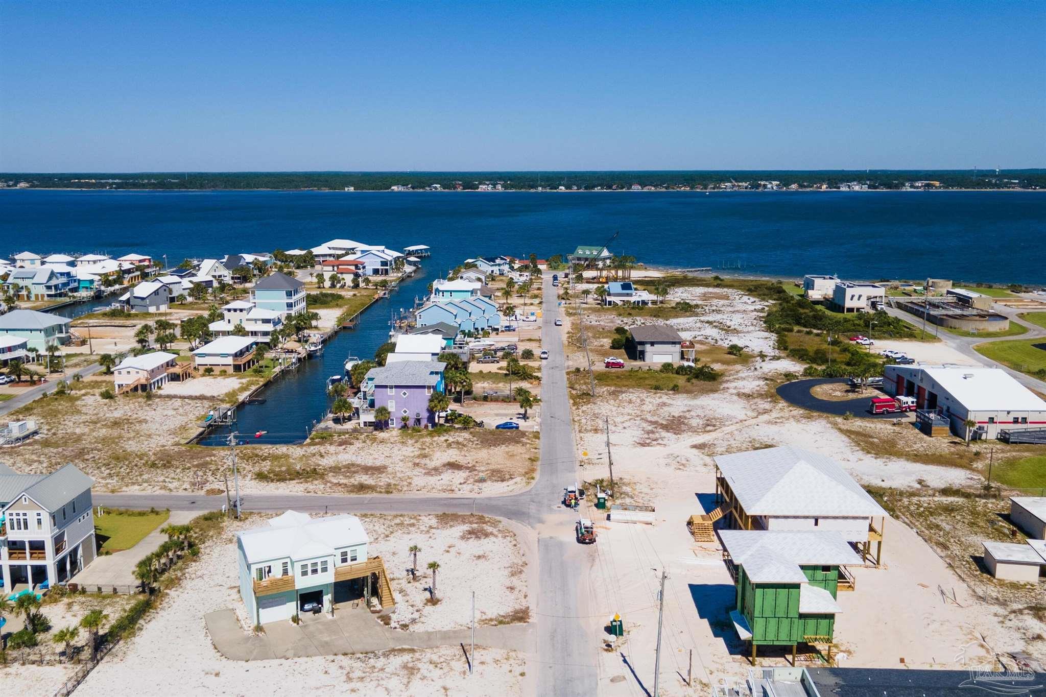 0 Gulf Boulevard Navarre, FL 32566 - Photo 19 of 22 an aerial view of ocean and residential houses with outdoor space