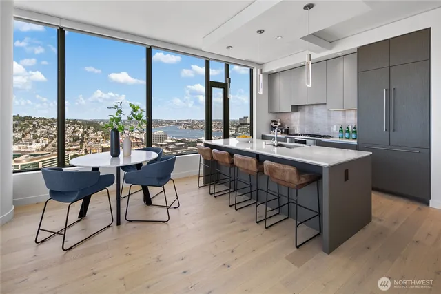 a view of a dining room with furniture window and outside view