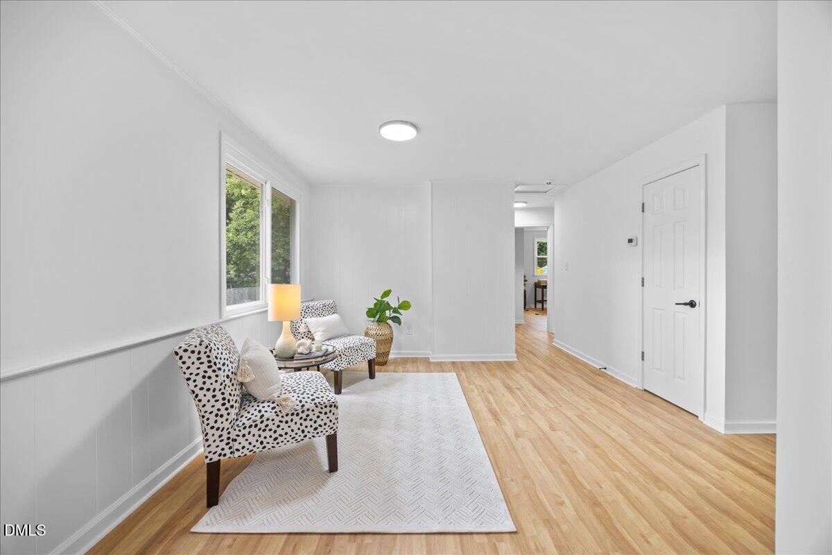 3437 Apache Drive Raleigh, NC 27609 - Photo 13 of 33 a living room with furniture and a rug