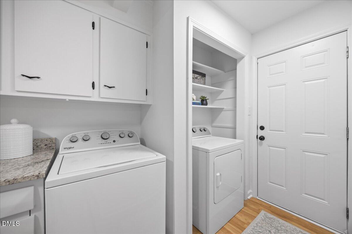 3437 Apache Drive Raleigh, NC 27609 - Photo 16 of 33 a view of storage and utility room with washer and dryer