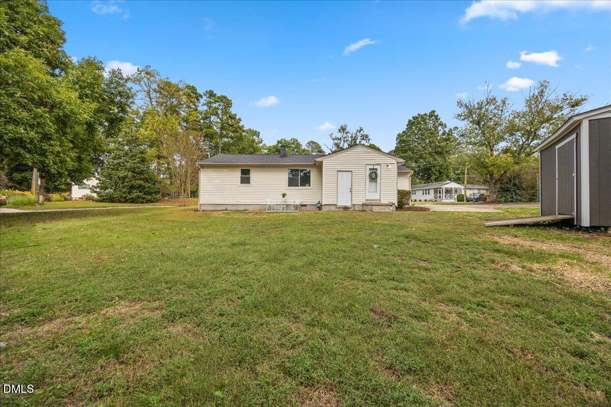 3437 Apache Drive Raleigh, NC 27609 - Photo 27 of 33 a view of a house with a big yard