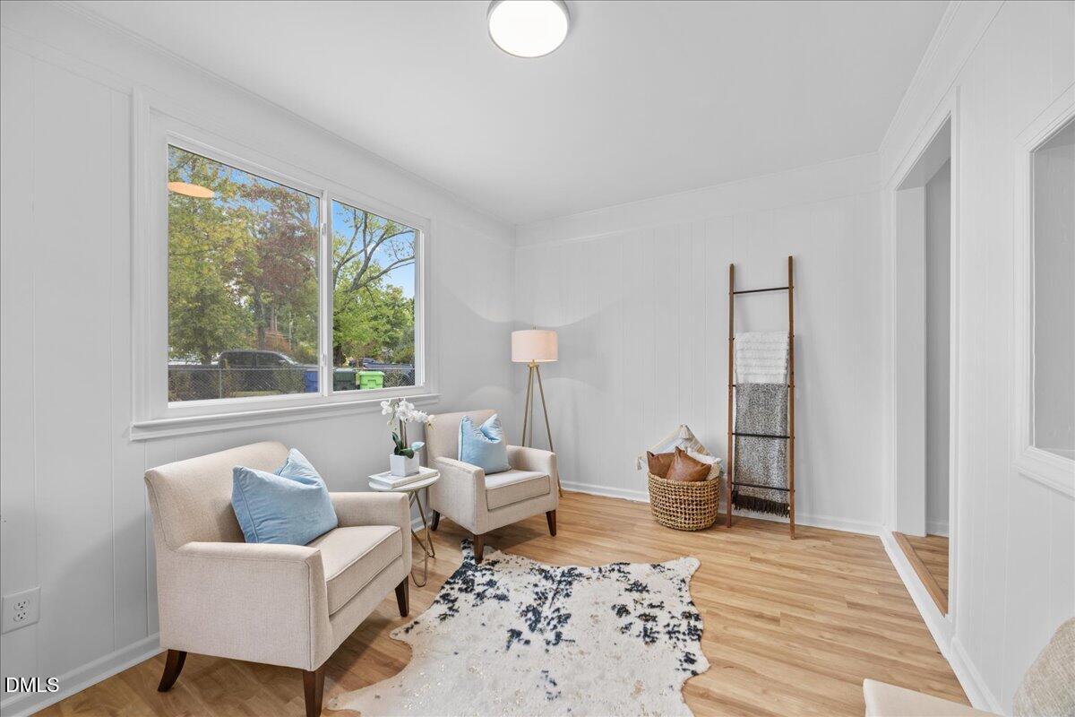 3437 Apache Drive Raleigh, NC 27609 - Photo 2 of 33 a living room with furniture and wooden floor