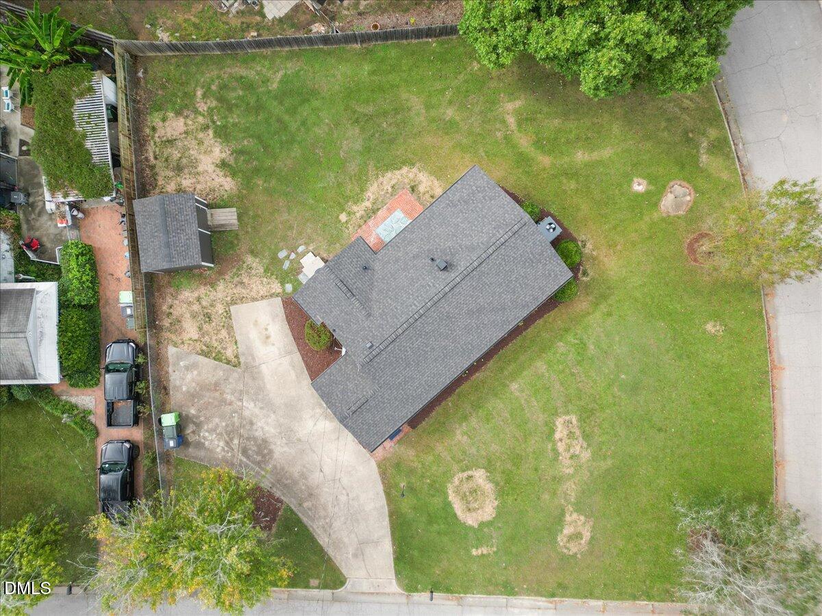 3437 Apache Drive Raleigh, NC 27609 - Photo 32 of 33 an aerial view of a house with a yard basket ball court and outdoor seating