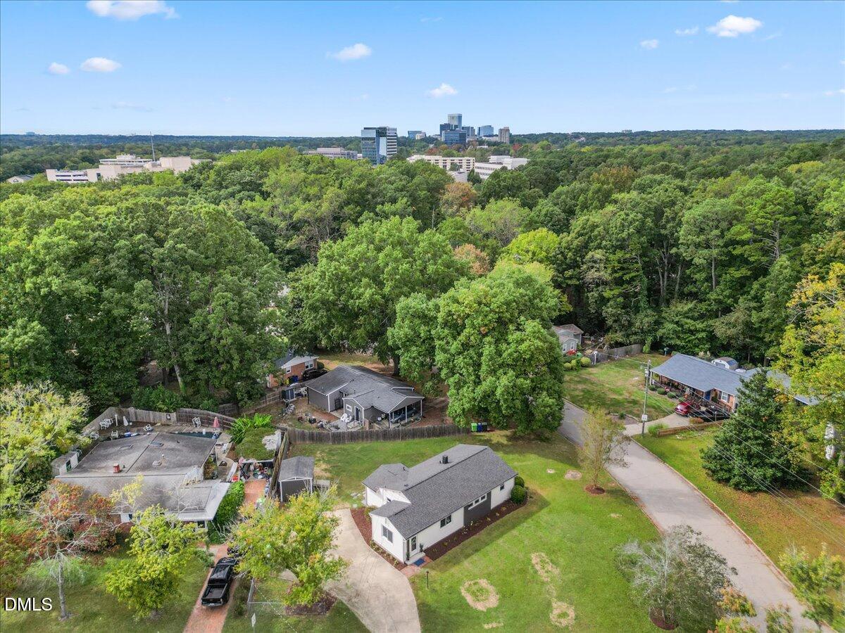 3437 Apache Drive Raleigh, NC 27609 - Photo 5 of 33 an aerial view of a house with a yard