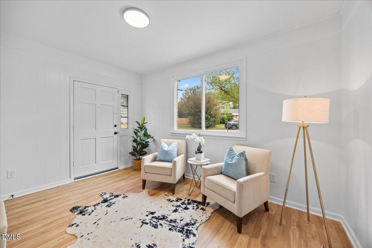 3437 Apache Drive Raleigh, NC 27609 - Photo 7 of 33 a living room with furniture and a wooden floor