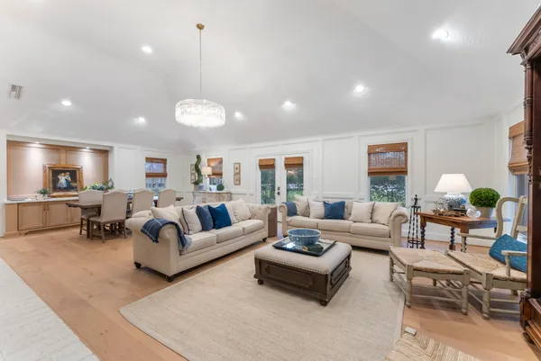 a view of a lake with a house in the background