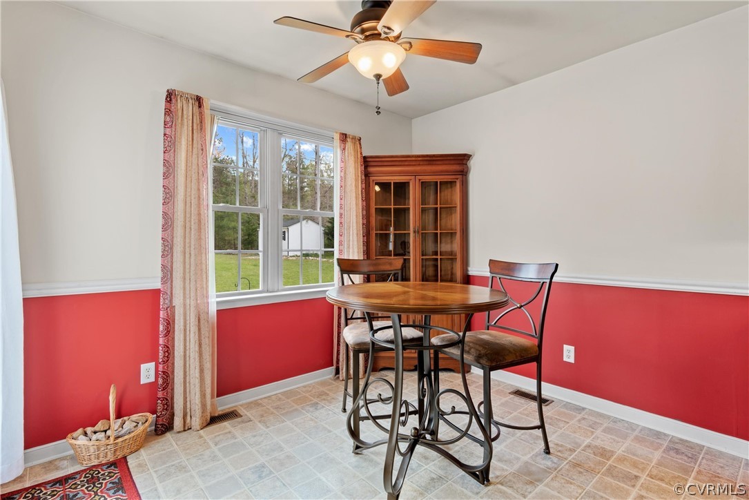 11918 Corte Castle Road Chesterfield, VA 23838 - Photo 12 of 40 a view of a dining room with furniture and chandelier