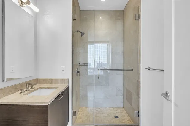 a bedroom with a bed and with a window