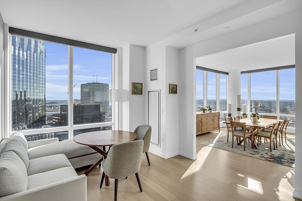1 Franklin Street, Unit 4606 Boston, MA 02110 - Photo 10 of 38 a living room with furniture and a large window