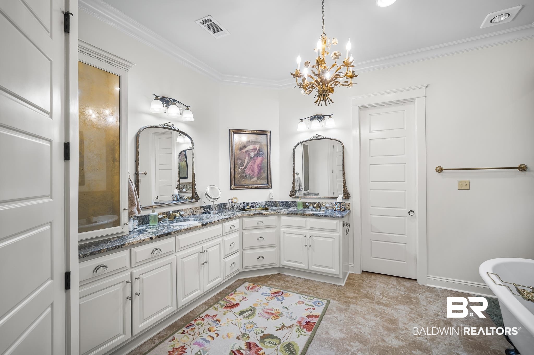 25212 Austin Road Daphne, AL 36526 - Photo 30 of 56 Full bath featuring ornamental molding, double vanity, a freestanding tub, and a chandelier
