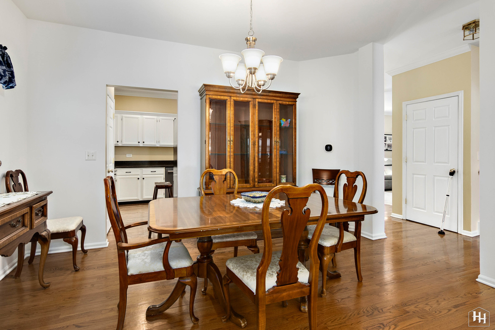 420 5th Street Wheeling, IL 60090 - Photo 12 of 34 a dining room with furniture window and wooden floor