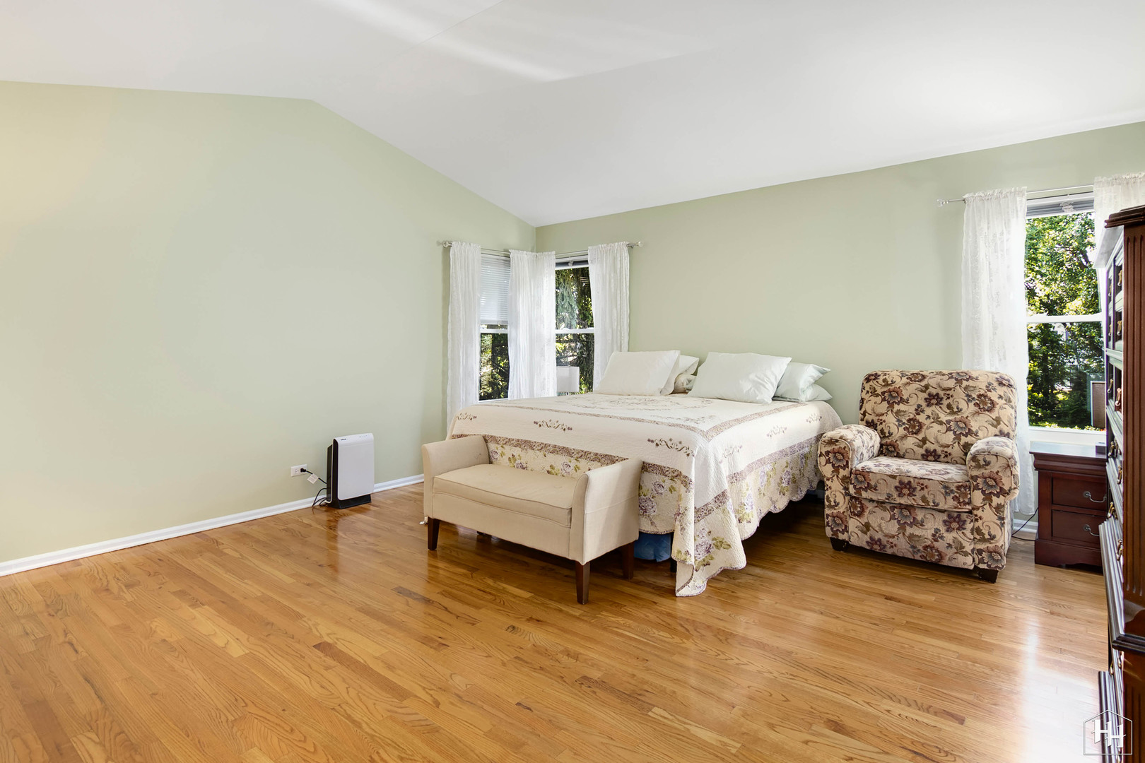 420 5th Street Wheeling, IL 60090 - Photo 18 of 34 a spacious bedroom with a bed and a couch