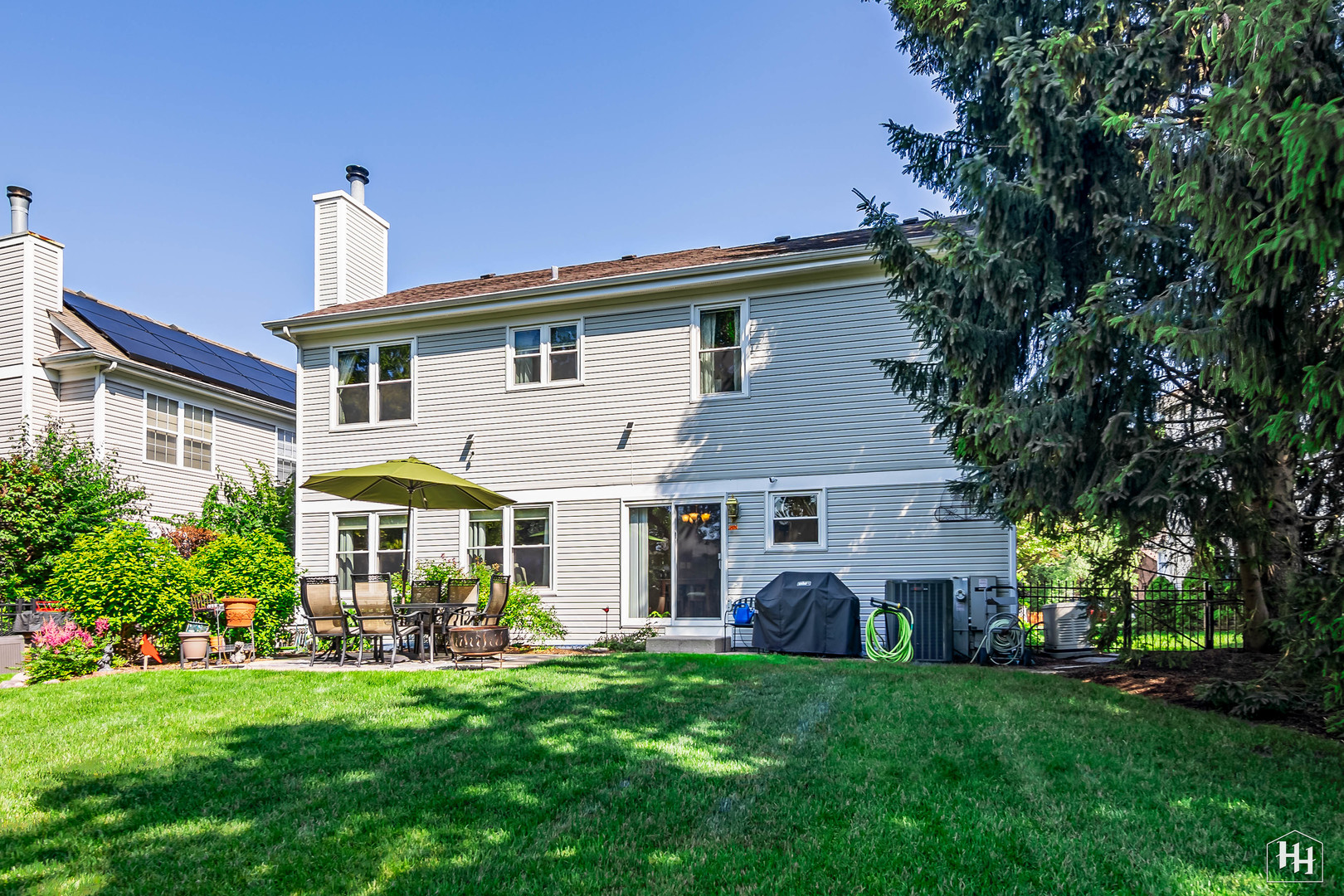 420 5th Street Wheeling, IL 60090 - Photo 29 of 34 a front view of house with yard and green space