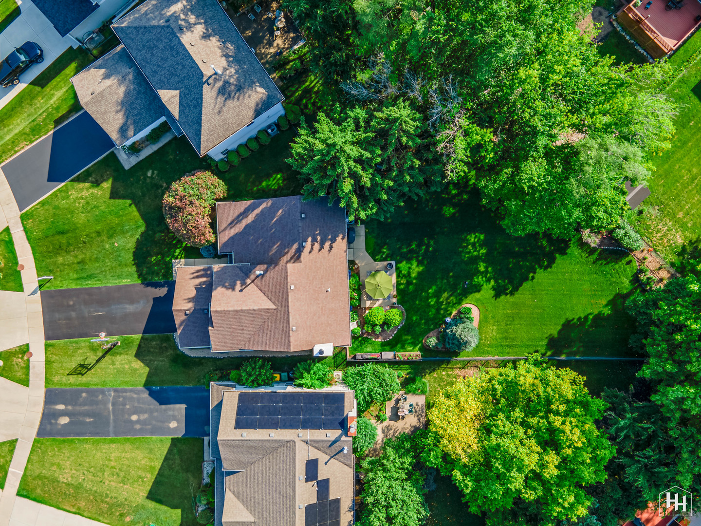 420 5th Street Wheeling, IL 60090 - Photo 32 of 34 an aerial view of a house with garden space sitting space and swimming pool
