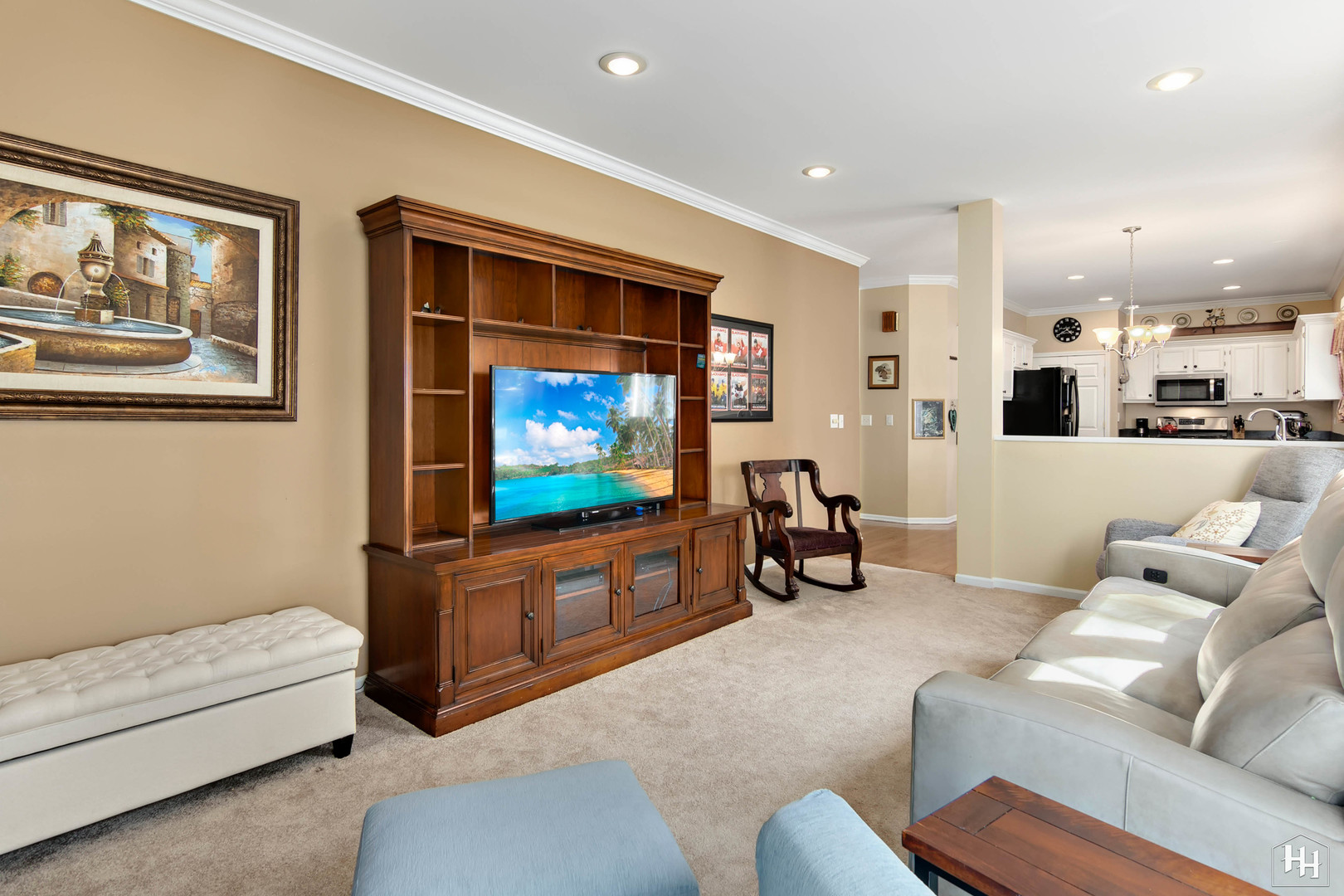 420 5th Street Wheeling, IL 60090 - Photo 9 of 34 a living room with furniture and a flat screen tv