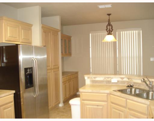 213 Country Club Boulevard Portland, TX 78374 - Photo 3 of 10 a bathroom with a sink and a mirror
