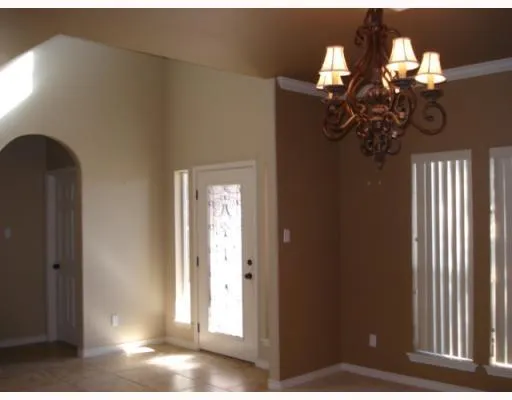 a view of a chandelier fan in a bathroom