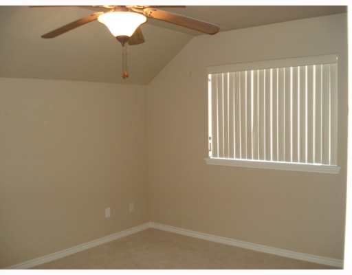 213 Country Club Boulevard Portland, TX 78374 - Photo 7 of 10 a view of a small space with a window