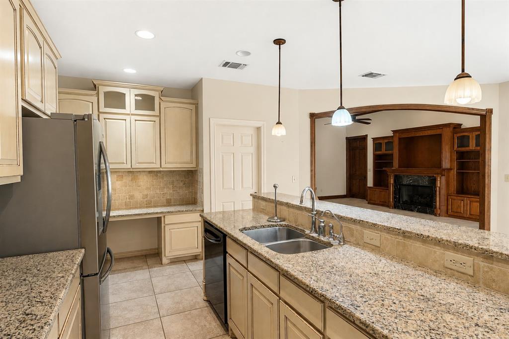 4940 North Frontage Road Winfield, TX 75455 - Photo 23 of 40 A Built in Desk is So Handy for the Self-Employed! Refrigerator/Freezer is Included with the Purchase of the Home...