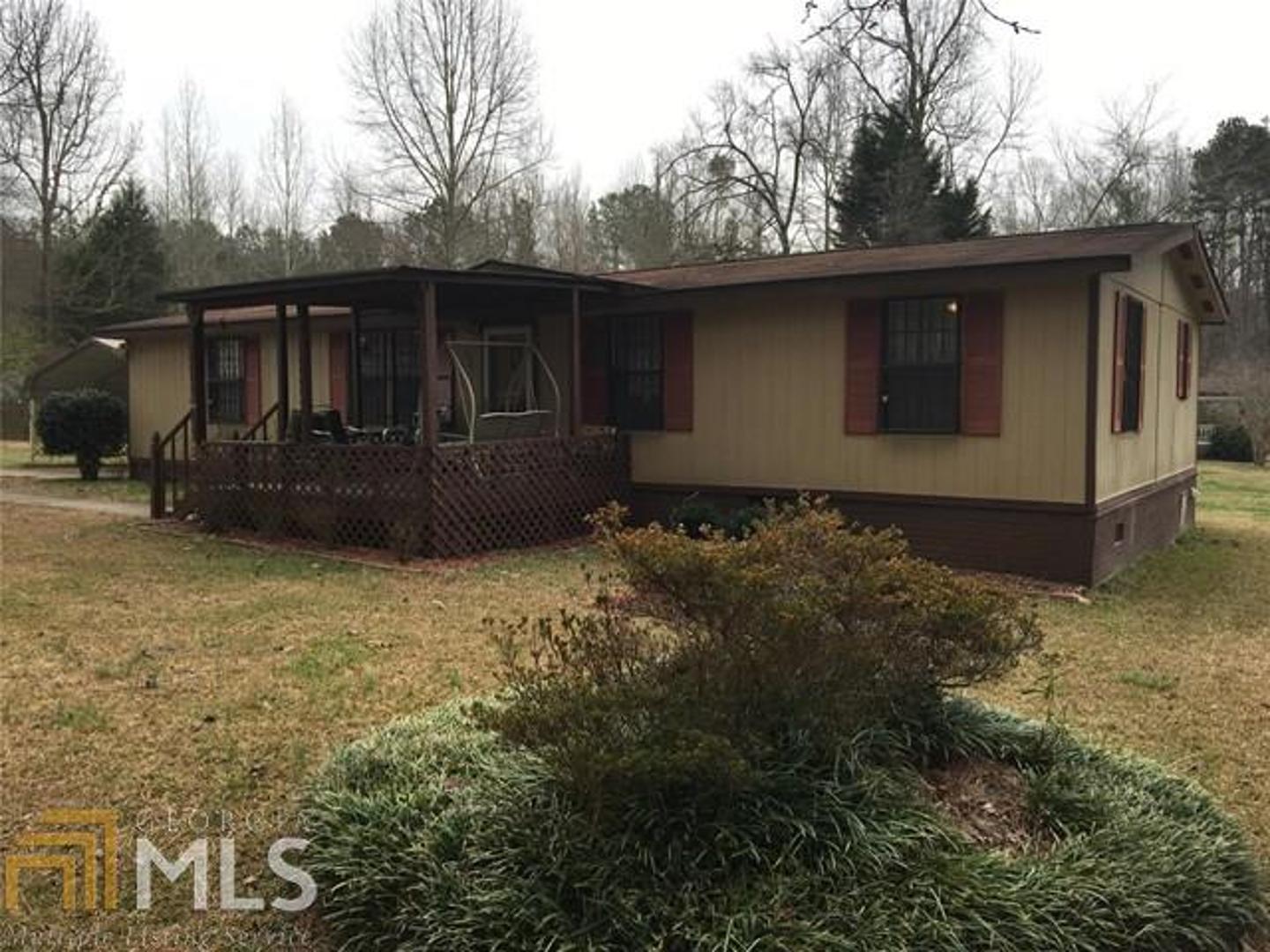 10 Woodfield Road Covington, GA 30014 - Photo 1 of 1 a view of backyard of house