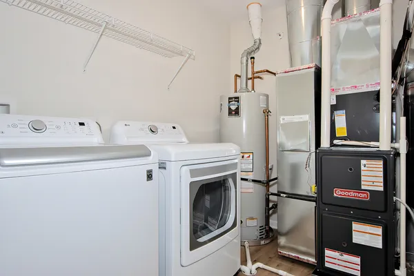 a utility room with dryer and washer