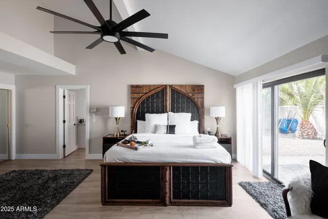 a bed room with a bed window and a couch