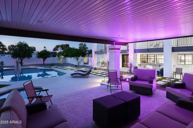 a view of a swimming pool with a patio