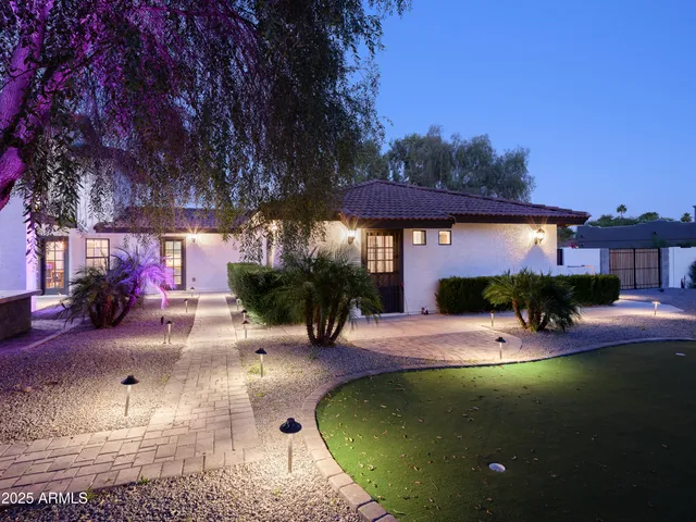 a view of a house with entertaining space