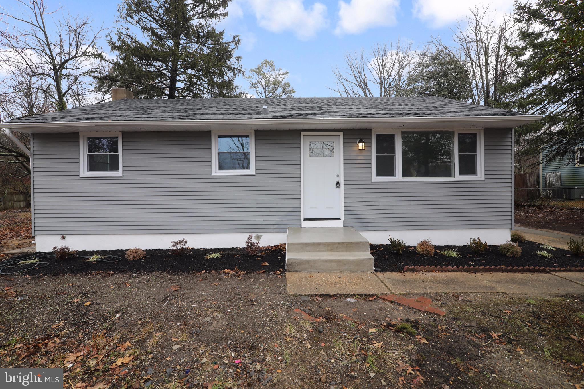 112 Country Club Road Pine Hill, NJ 08021 - Photo 1 of 22 a view of a house with a yard